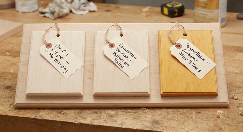 Comparison of three finish samples on maple showing yellowing on polyurethane